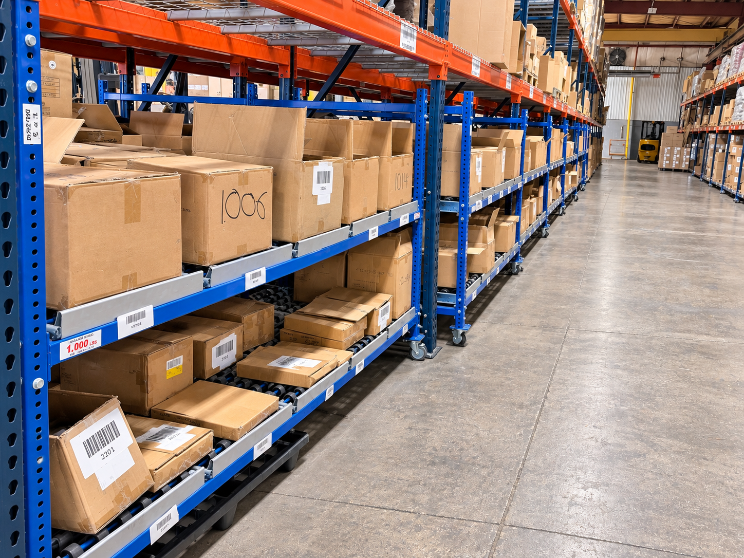 Inventory cartons on blue storage racks at TalaTrans Chicago e-commerce fulfillment warehouse